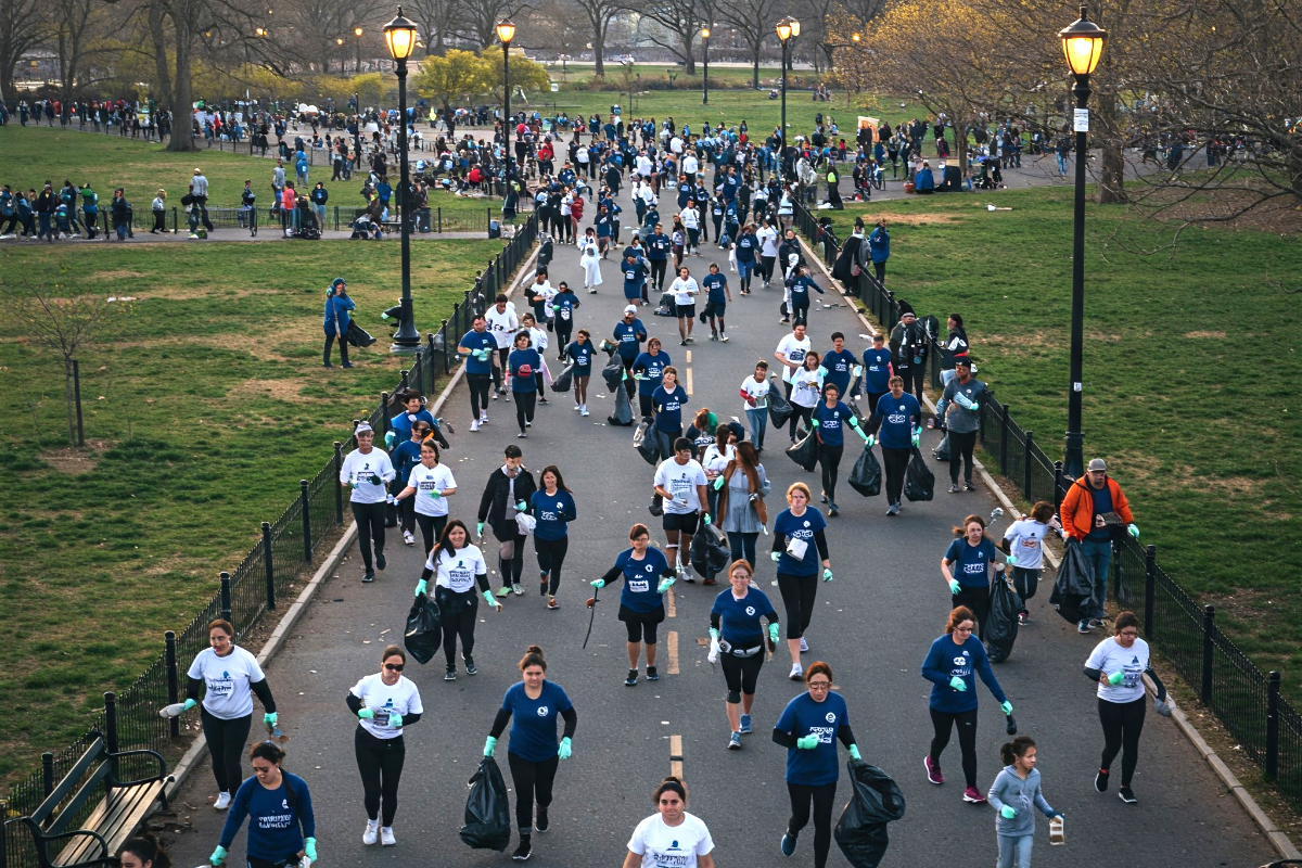 People Jogging And Picking Up Trash Or Plogging 1200X800